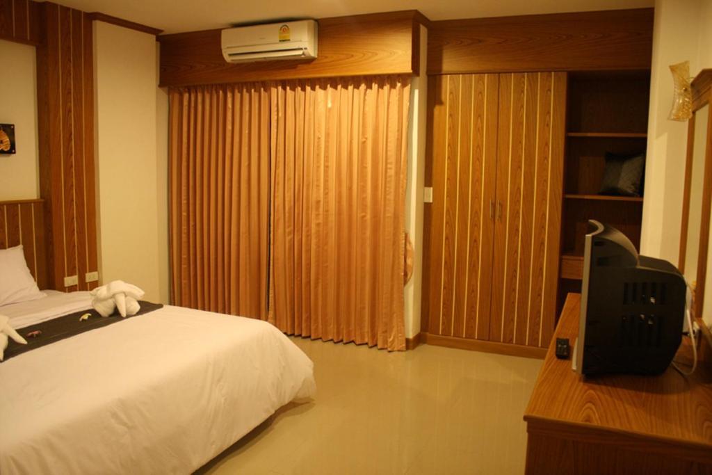 Santi White Hotel Phuket Habitación foto